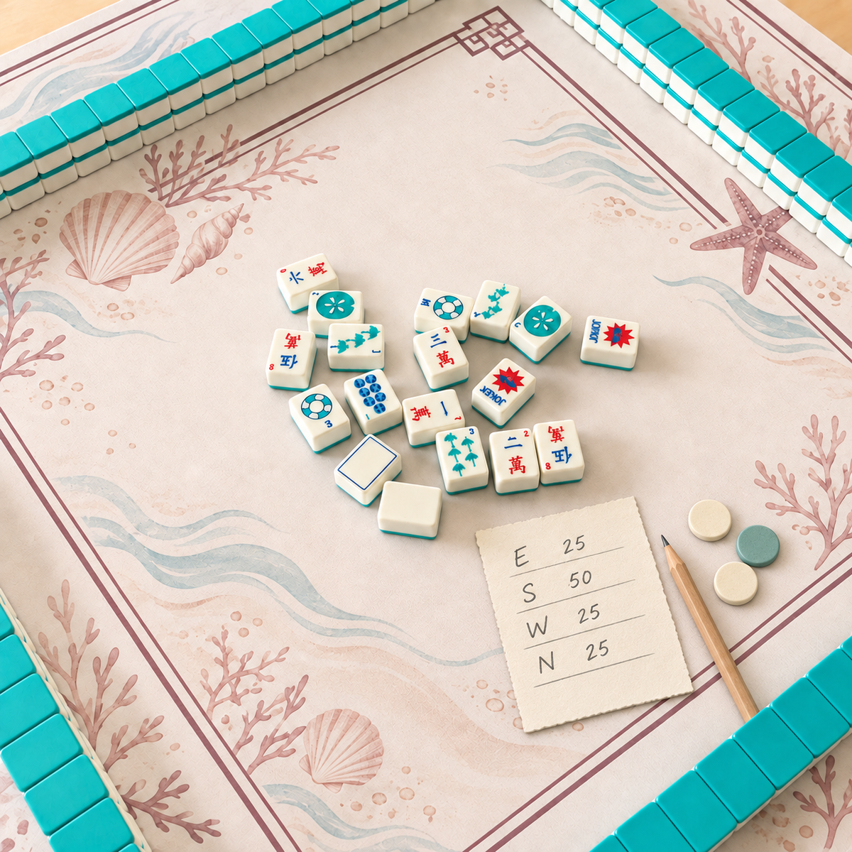 American mahjong tiles beside a handwritten score sheet