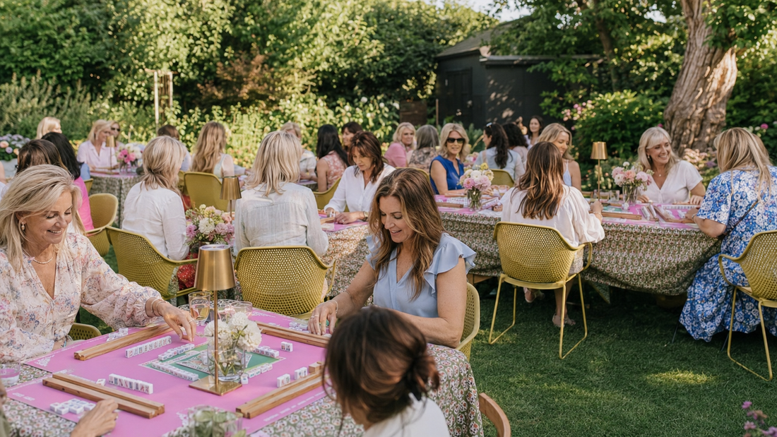 Women playing mahjong together at a garden club gathering